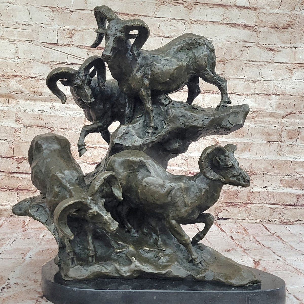 Dynamic Bronze Sculpture of Rams on Rocky Outcrop – Wildlife Scene on ...