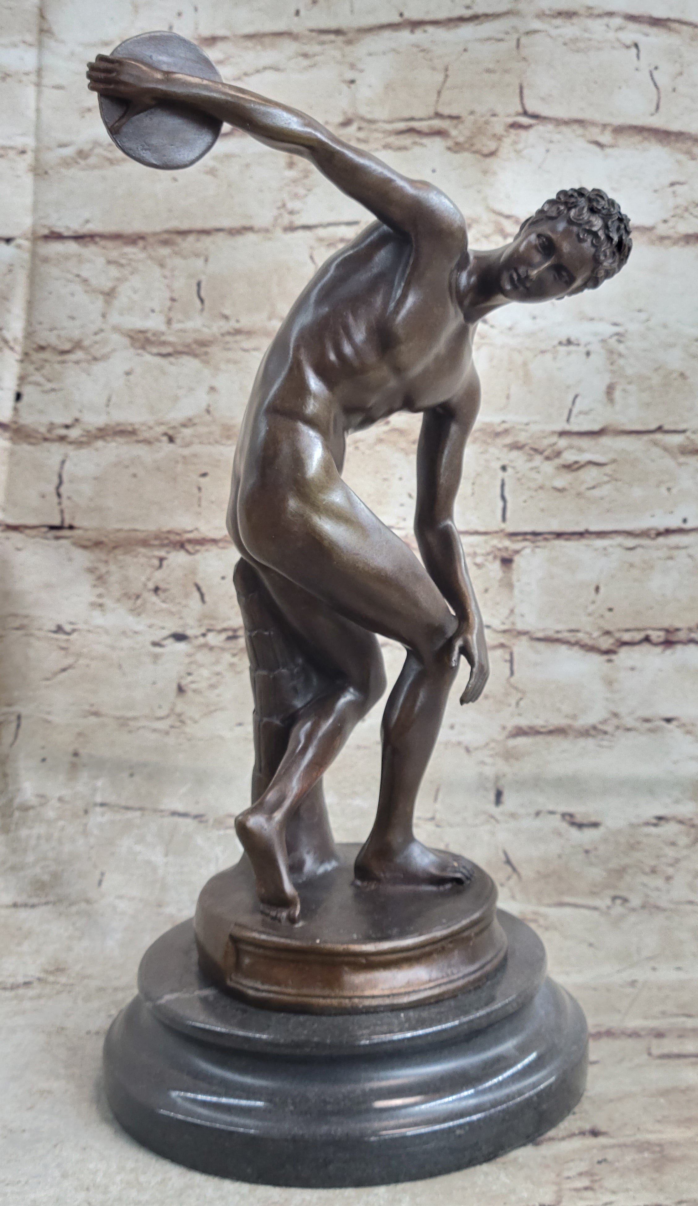 Discobolus By Myron