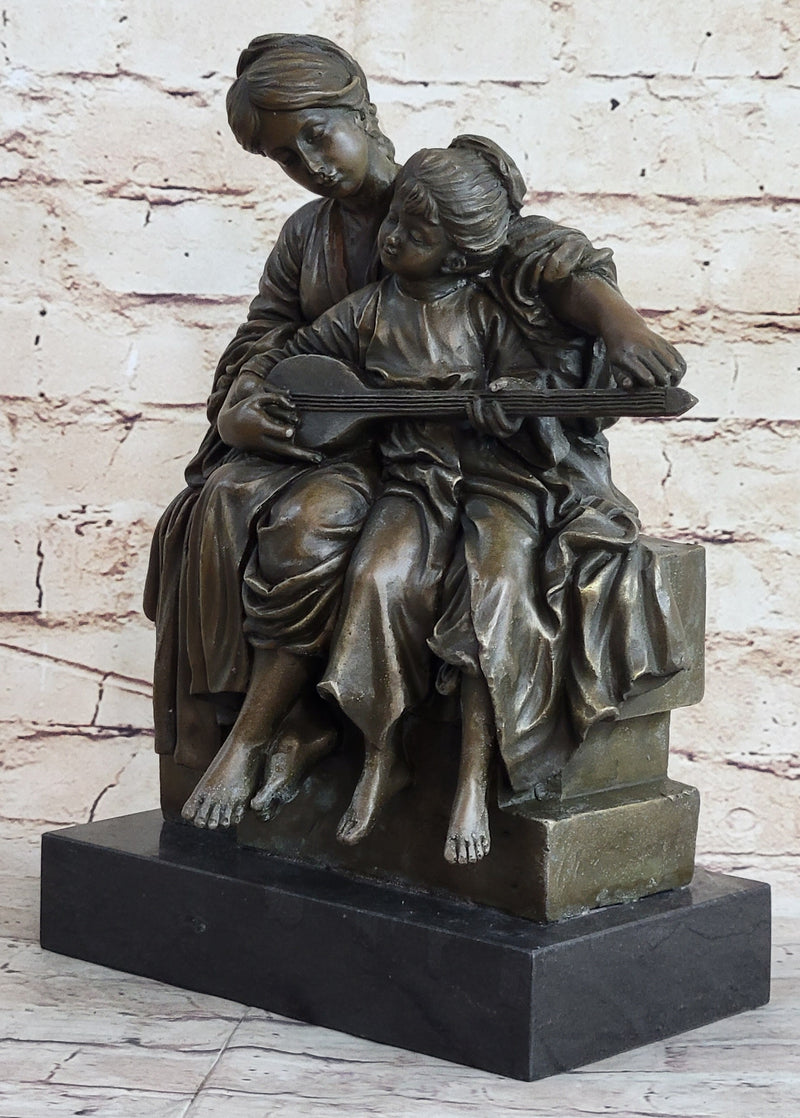 Mother and Daughter Playing Guitar Bronze Sculpture