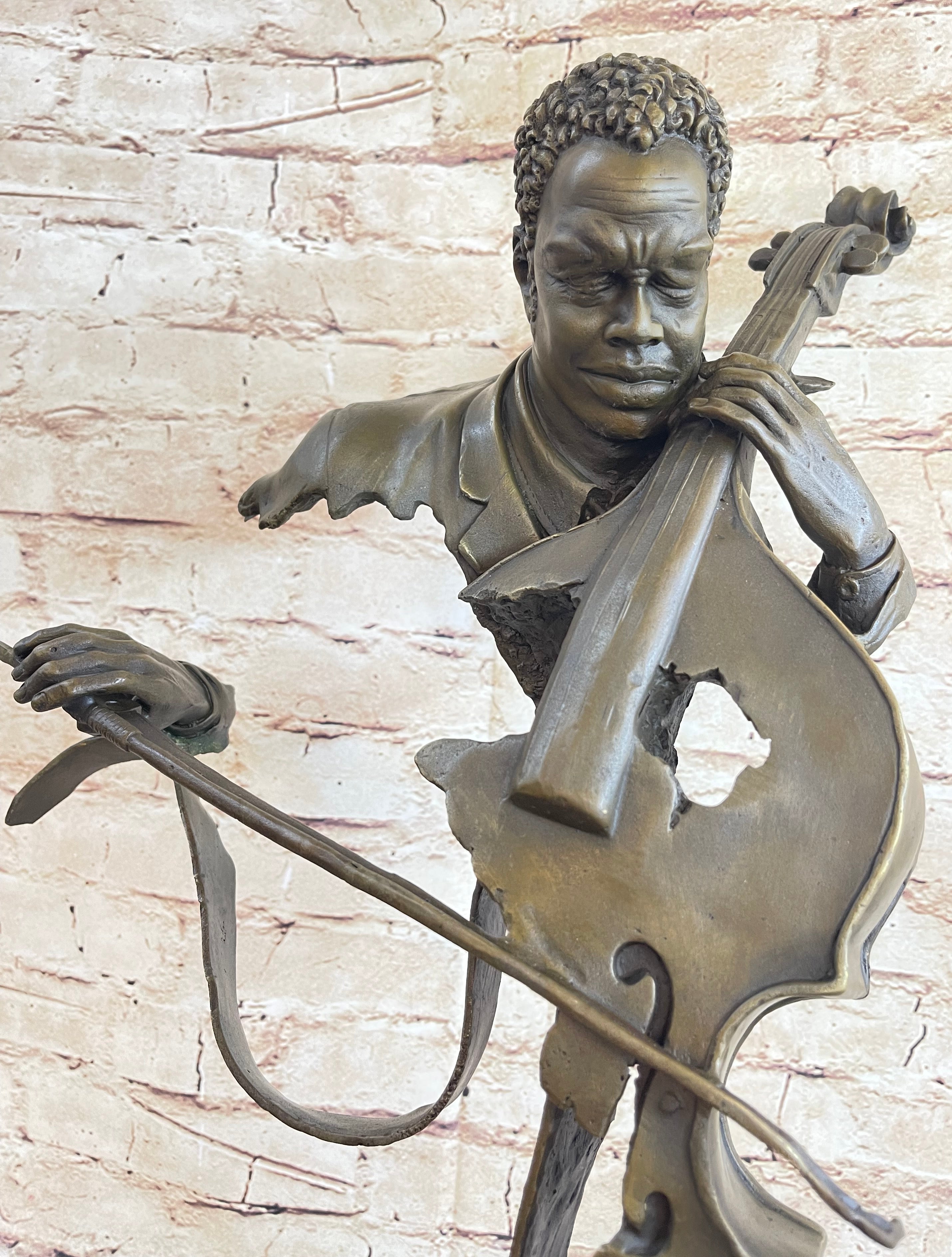 Metal bronze retailer brass seated musician player statue patina